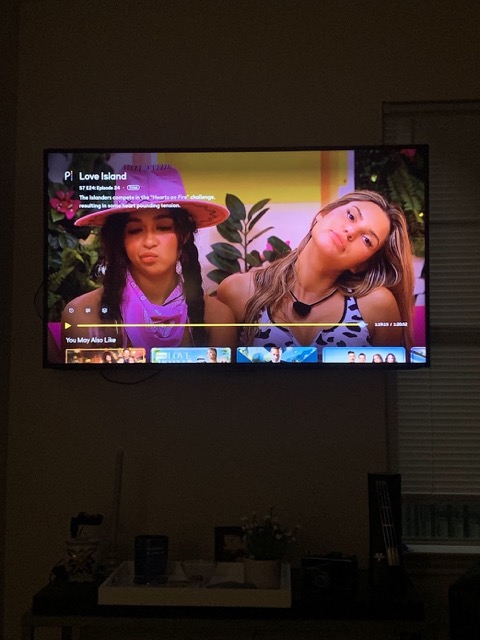 Taylor's televison screen with Love Island playing on it